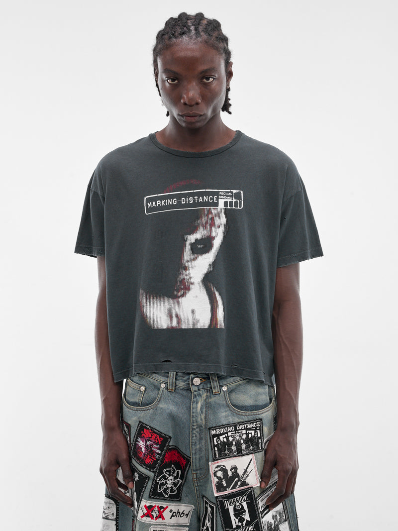 MARKING DISTANCE Distressed Manhunt Tee | H.Lorenzo - front