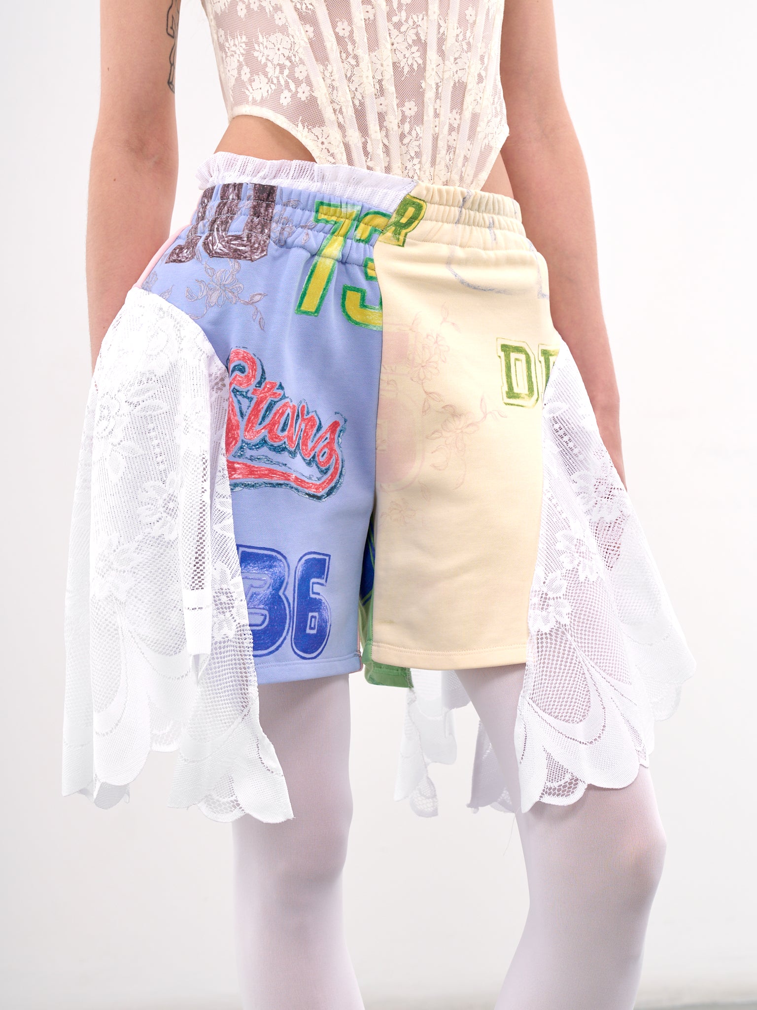 Asymmetric Patchwork Ruffled Shorts (00TR04-MULTI)