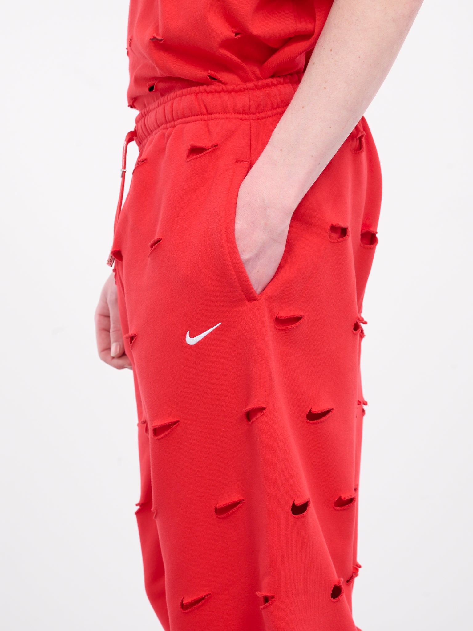 Jacquemus Cut-Out Swoosh Sweatpants (FJ3268-657-RED)