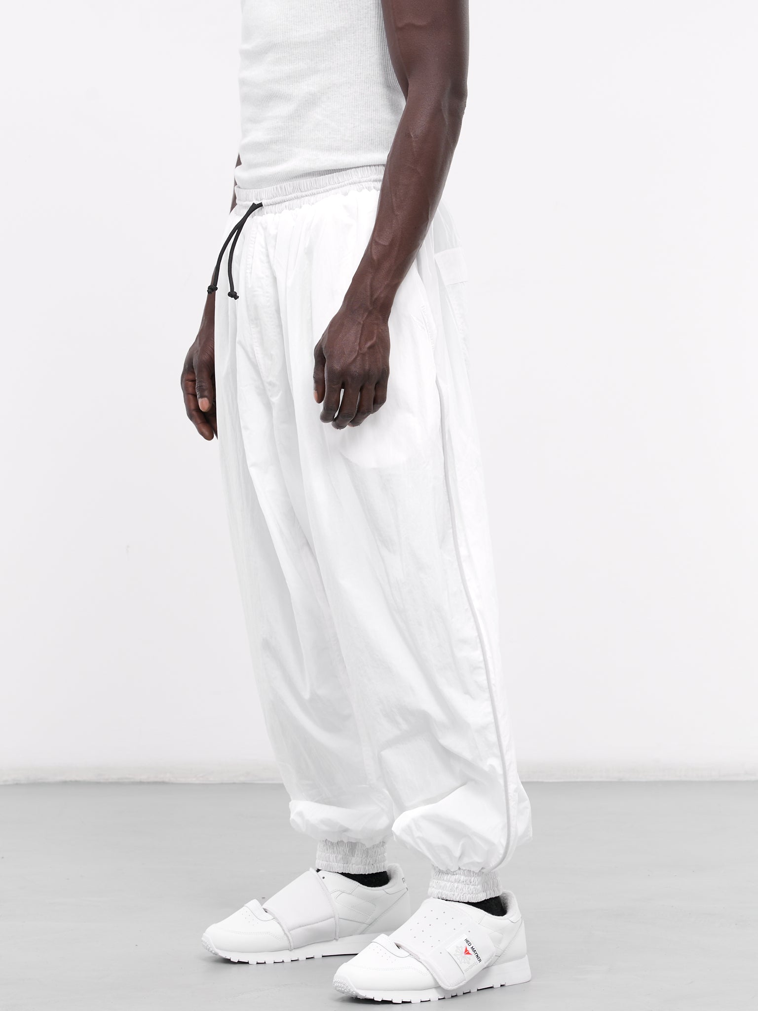 Reebok white track pants on sale