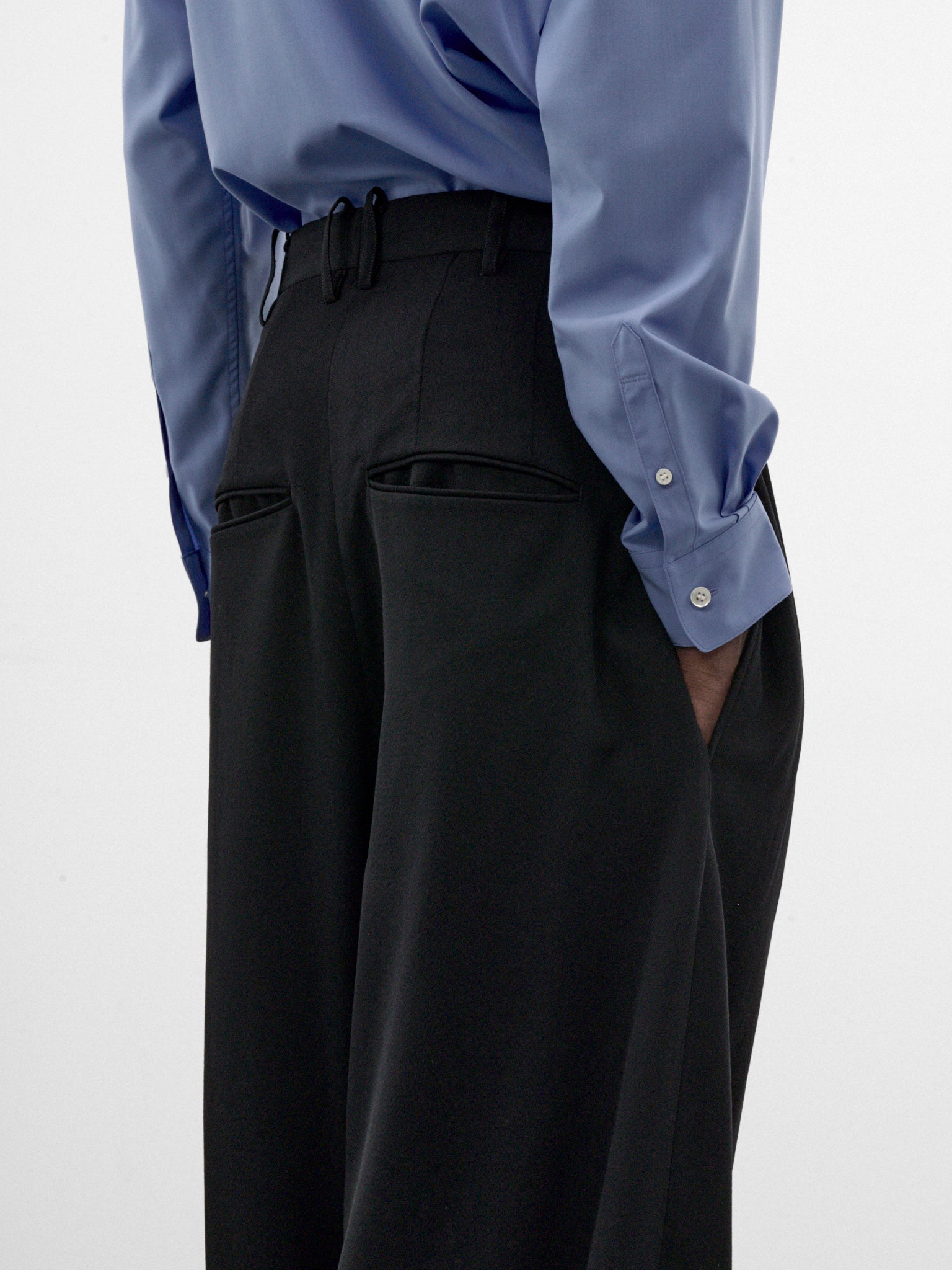 Black Wool Eight-Tuck Trousers (S26AW20PT-W-BLACK)