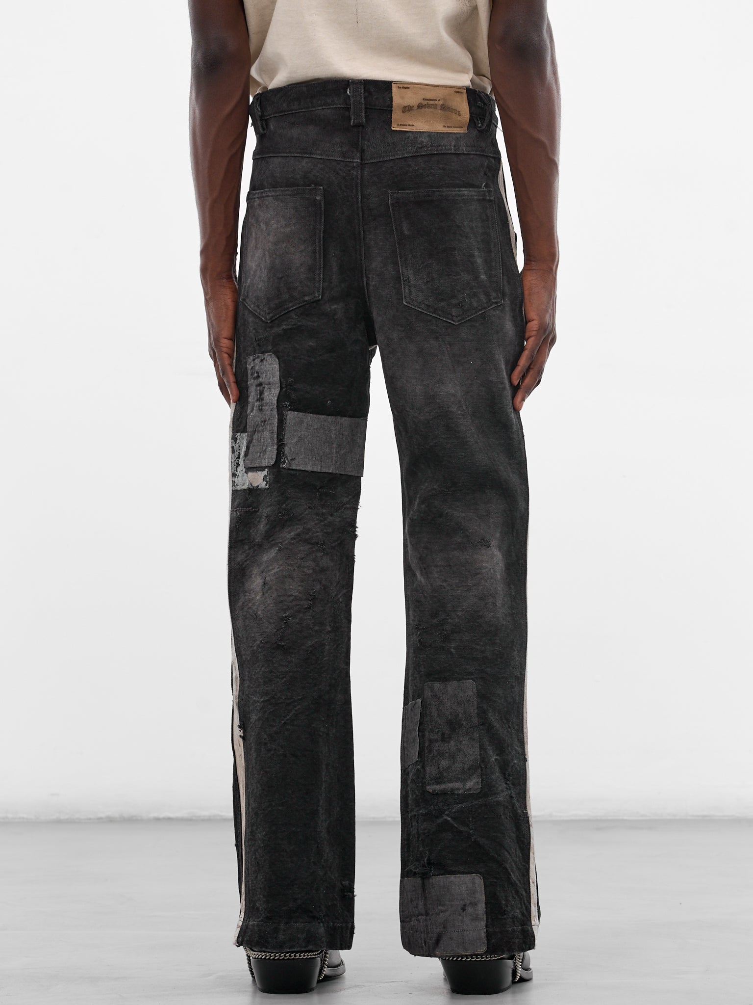 Mailbag Patchwork Western Flare Pants (SEK-FW25-PNT11-BLACK-MAILBAG)