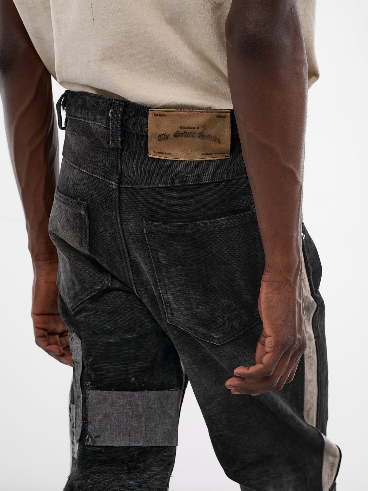 Mailbag Patchwork Western Flare Pants (SEK-FW25-PNT11-BLACK-MAILBAG)